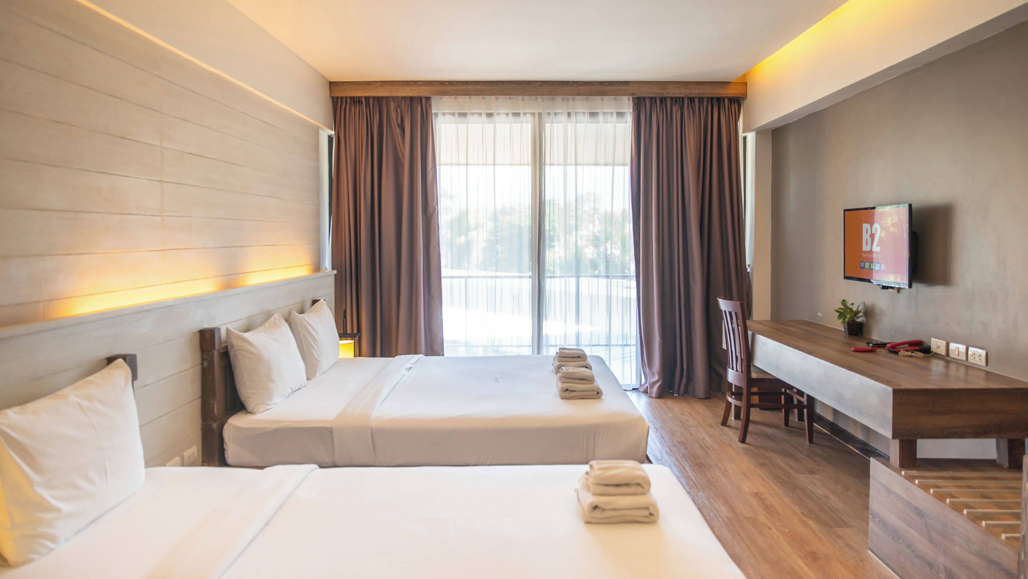 Luxury Triple Room | Una cassaforte in camera, una scrivania, tende oscuranti, Wi-Fi gratuito