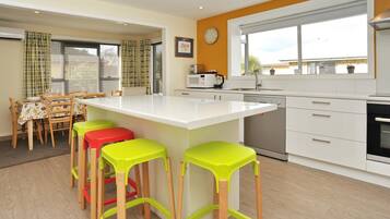 Villa, 4 Bedrooms | Private kitchen | Full-sized fridge, microwave, oven, stovetop