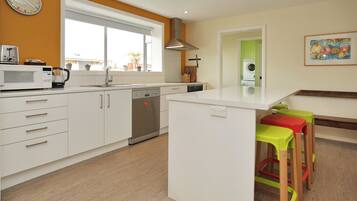 Villa, 4 Bedrooms | Private kitchen | Full-sized fridge, microwave, oven, stovetop