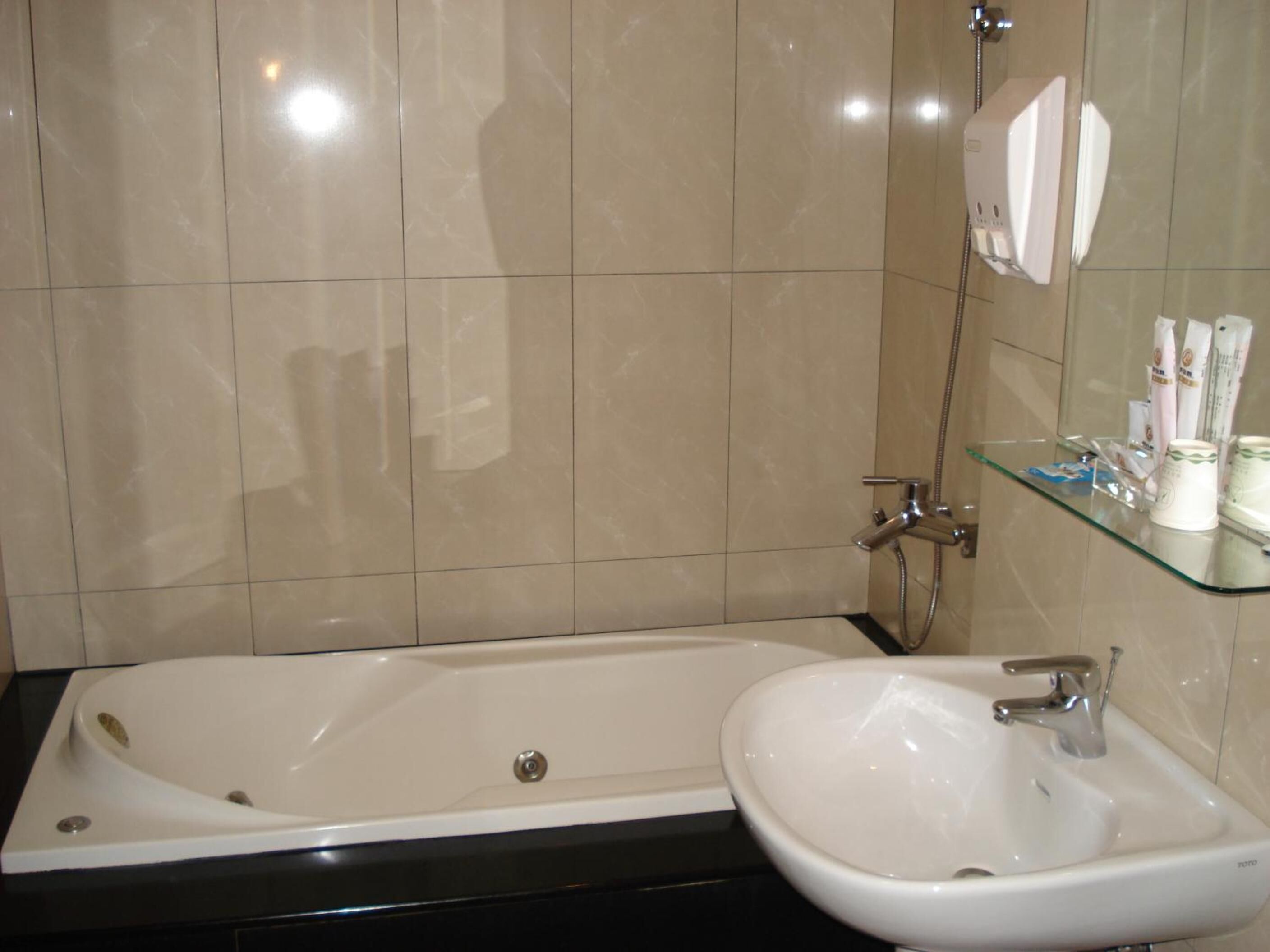 free toiletries, hair dryer, slippers, towels