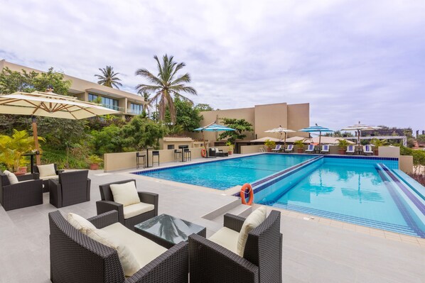 2 outdoor pools, pool umbrellas, pool loungers