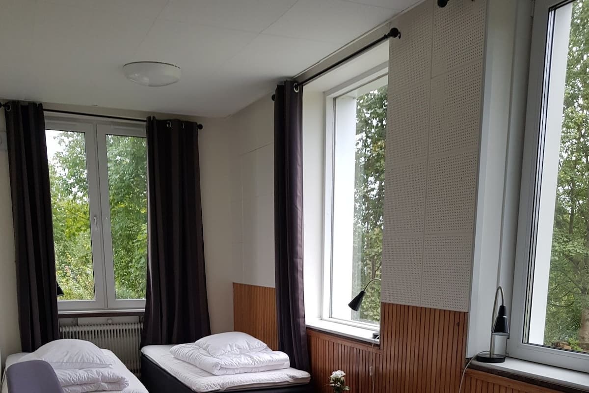 Quadruple Room, Shared Bathroom | Blackout drapes, cribs/infant beds, rollaway beds, free WiFi