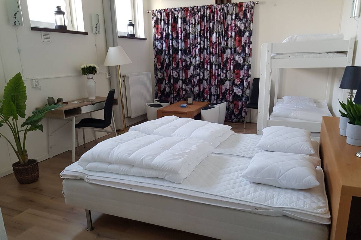 Family Room - 1 Double Bed and 1 Bunk Bed - Private WC, Shared Shower | Blackout drapes, cribs (surcharge), rollaway beds (surcharge)
