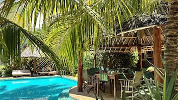 2 outdoor pools, pool umbrellas, pool loungers