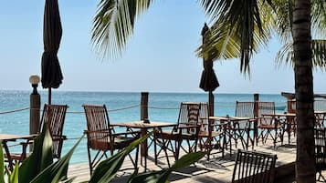 Breakfast, lunch, dinner served; international cuisine, pool views