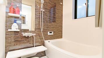 Premium Apartment, Multiple Beds | Deep soaking bathtub
