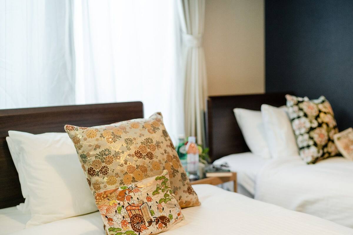 Desk, blackout curtains, free WiFi, bed sheets