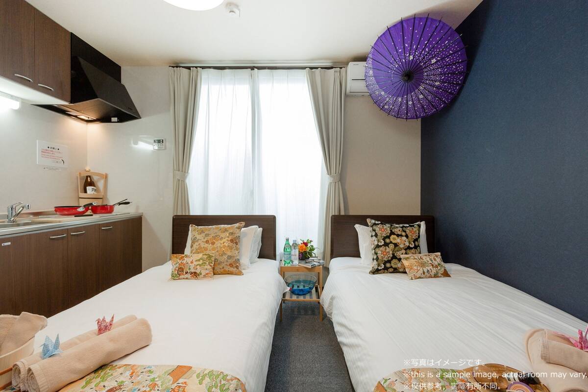 Desk, blackout curtains, free WiFi, bed sheets