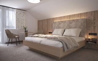 Ropa de cama hipoalergénica y caja de seguridad en la habitación 