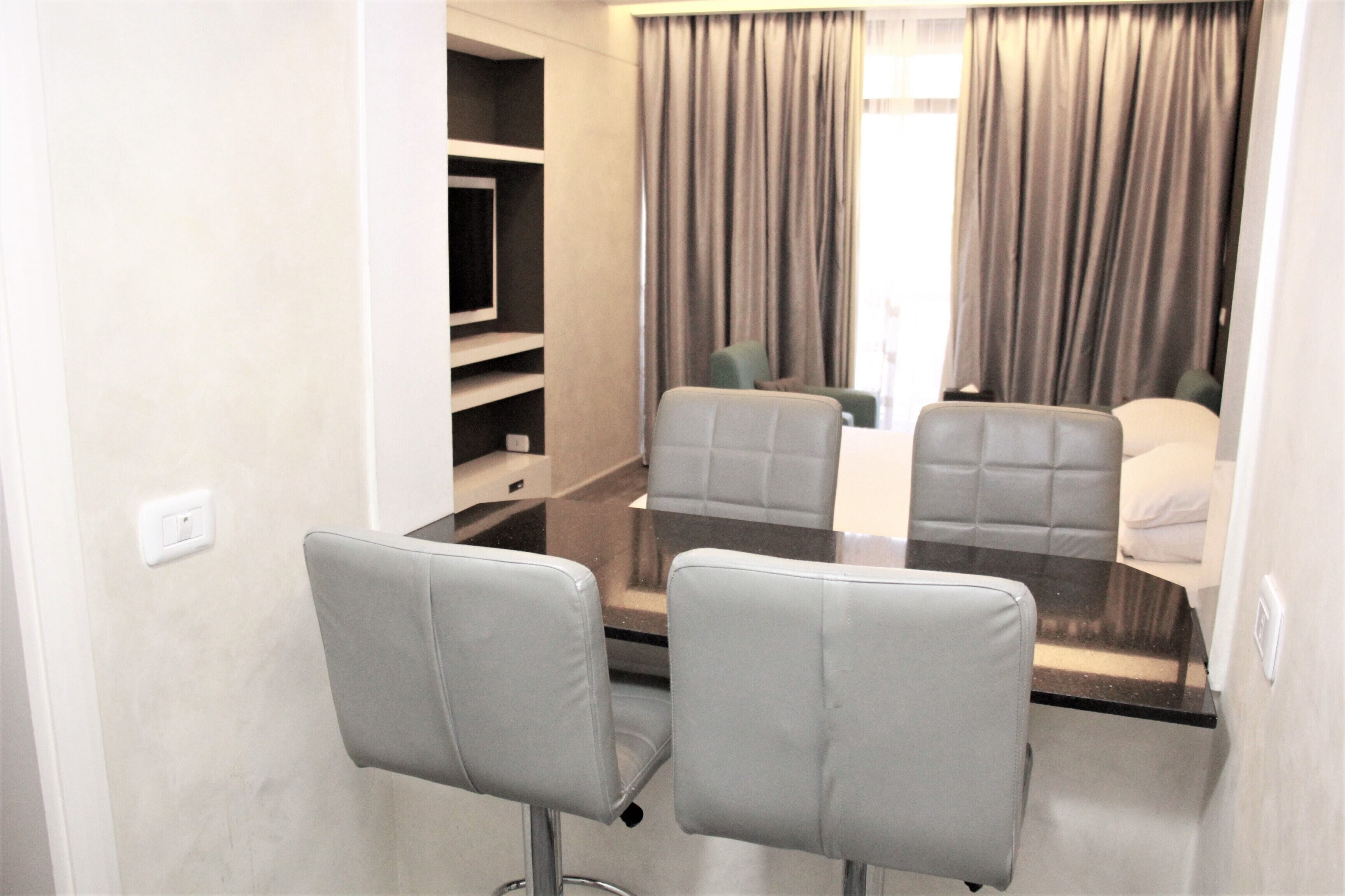 family suite, 2 bedrooms, city view | in-room dining