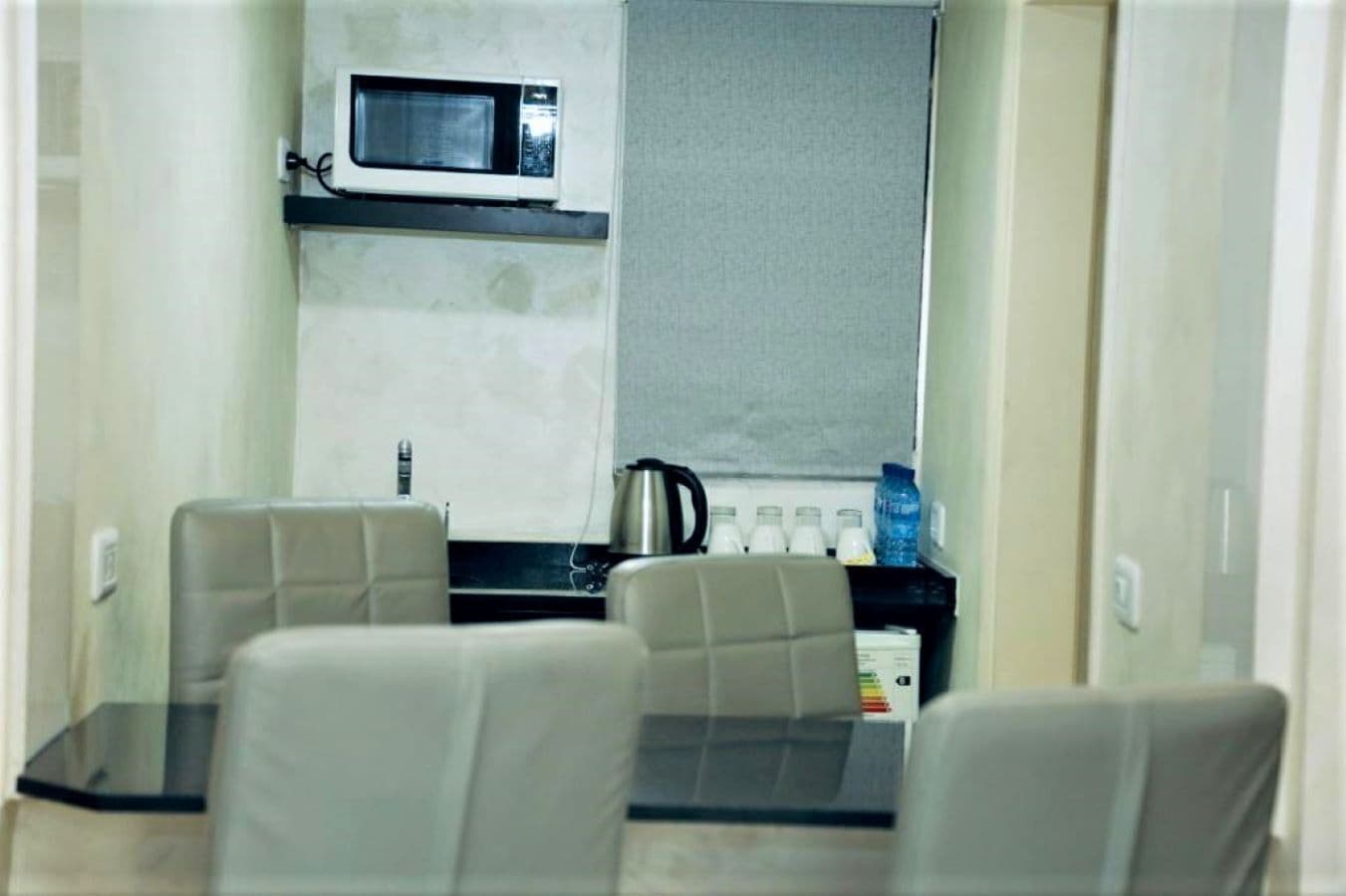 family suite, 2 bedrooms, city view | private kitchenette | fridge, microwave, coffee/tea maker, electric kettle