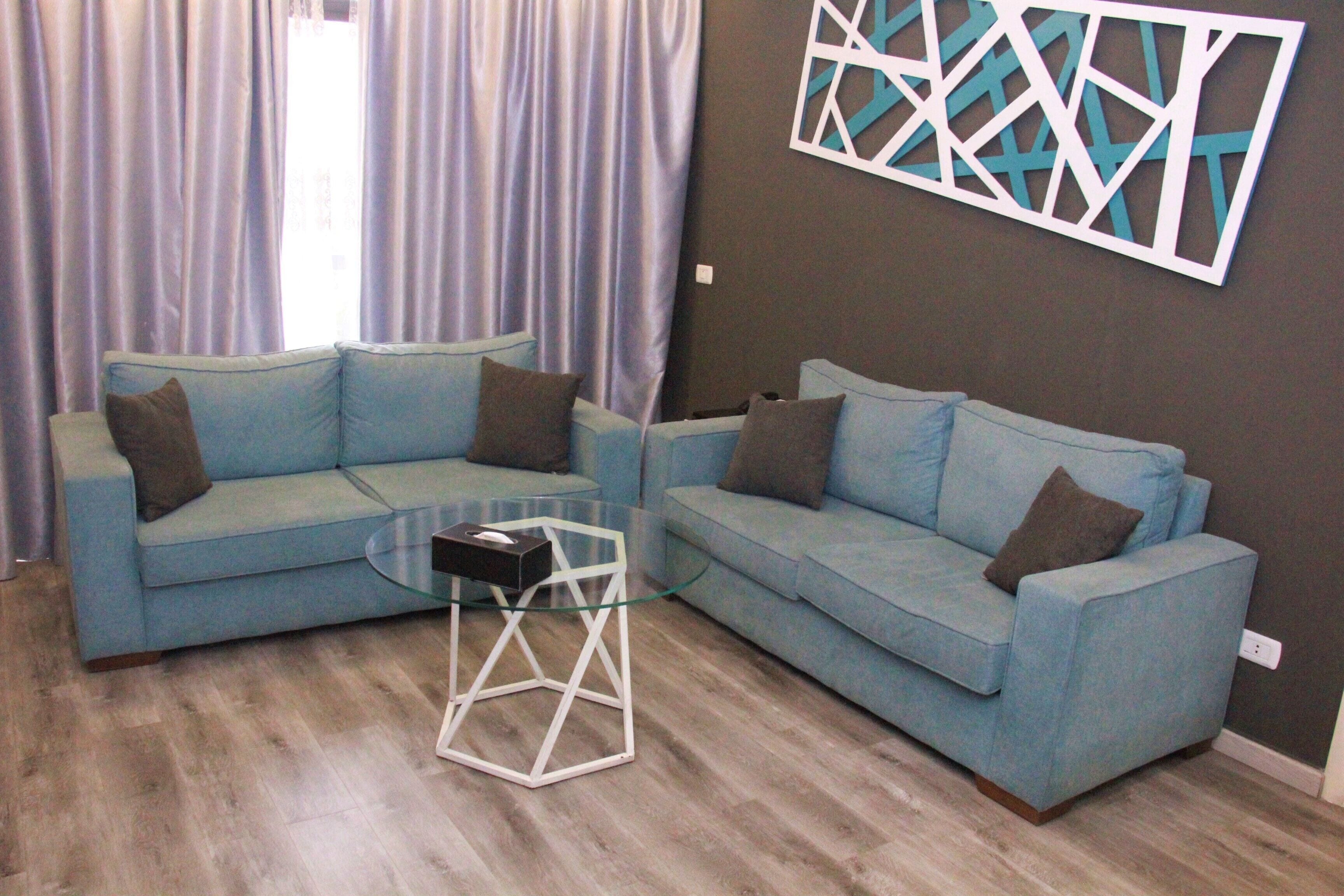 executive suite, city view | living room | 43-inch smart tv with satellite channels, tv, dvd player