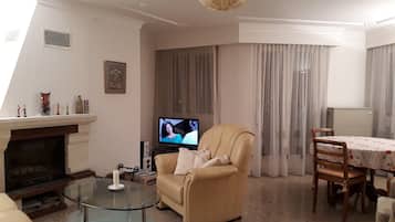 Apartment, 2 Bedrooms, 2 Bathrooms | Living area | 80-cm flat-screen TV with cable channels, LED TV, DVD player