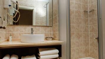 Shower, free toiletries, hair dryer, slippers