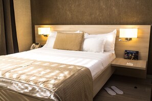 Ropa de cama de alta calidad y minibar 