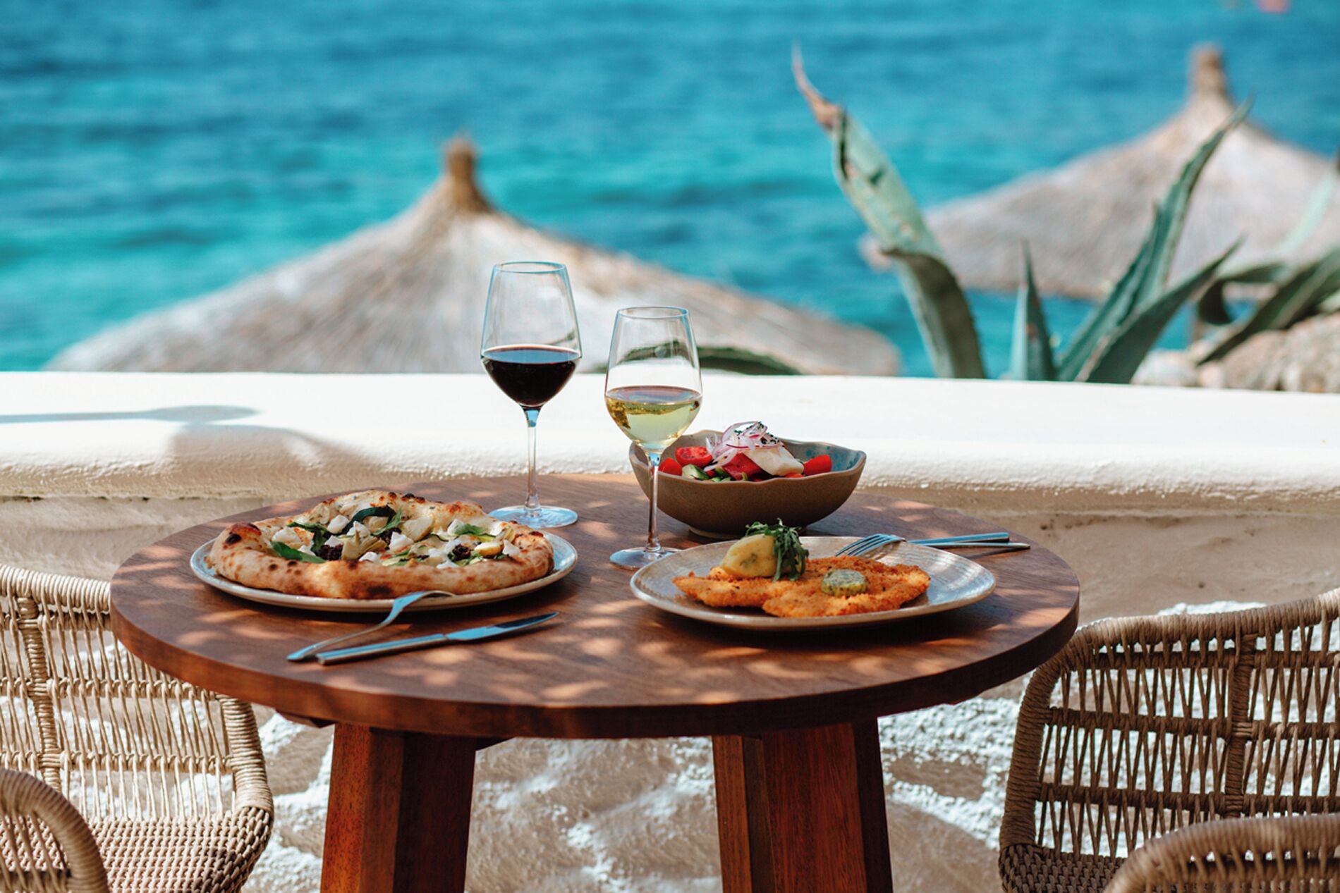 breakfast, lunch, dinner served; beach views