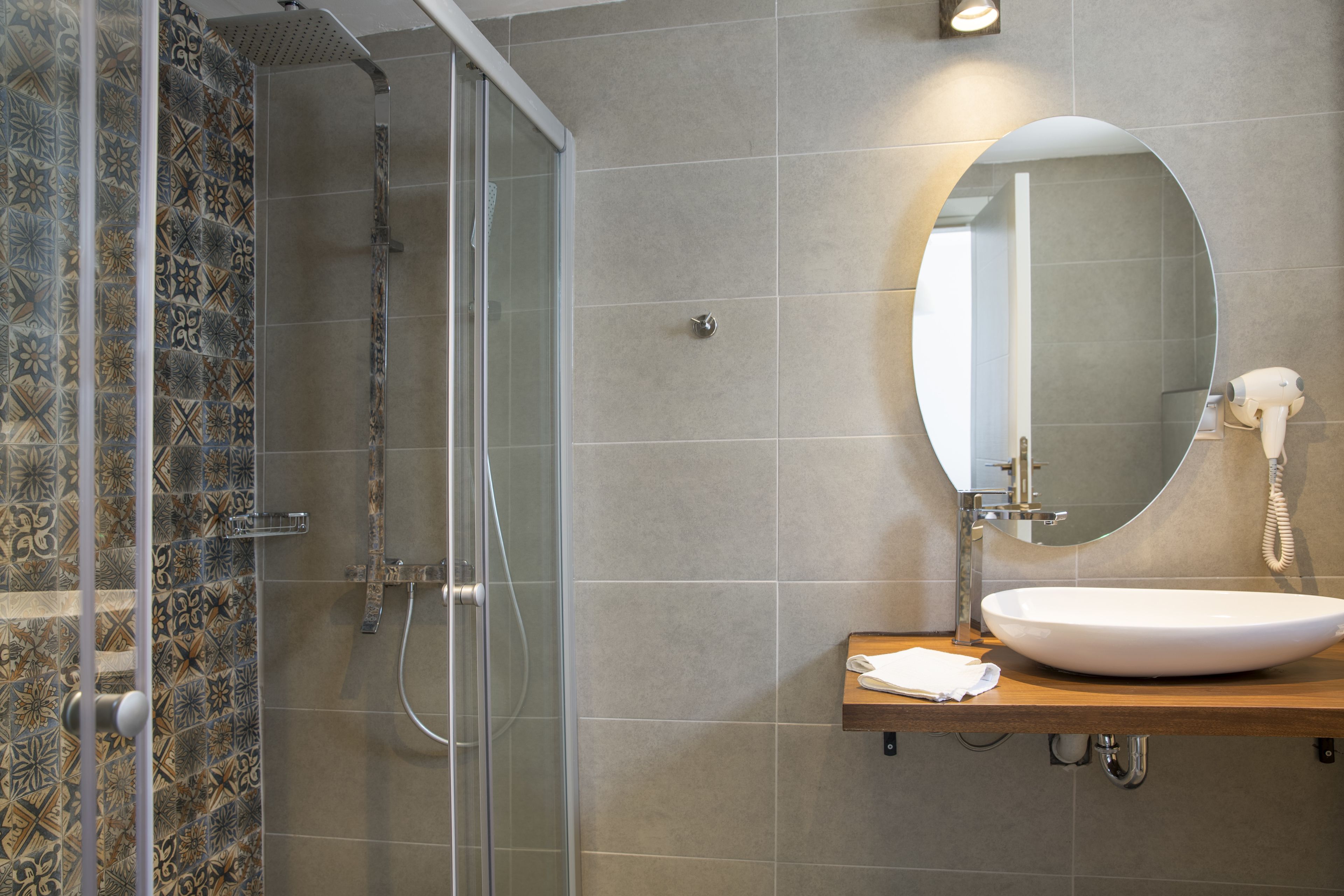 shower, free toiletries, hair dryer, slippers