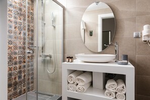 Shower, free toiletries, hair dryer, slippers