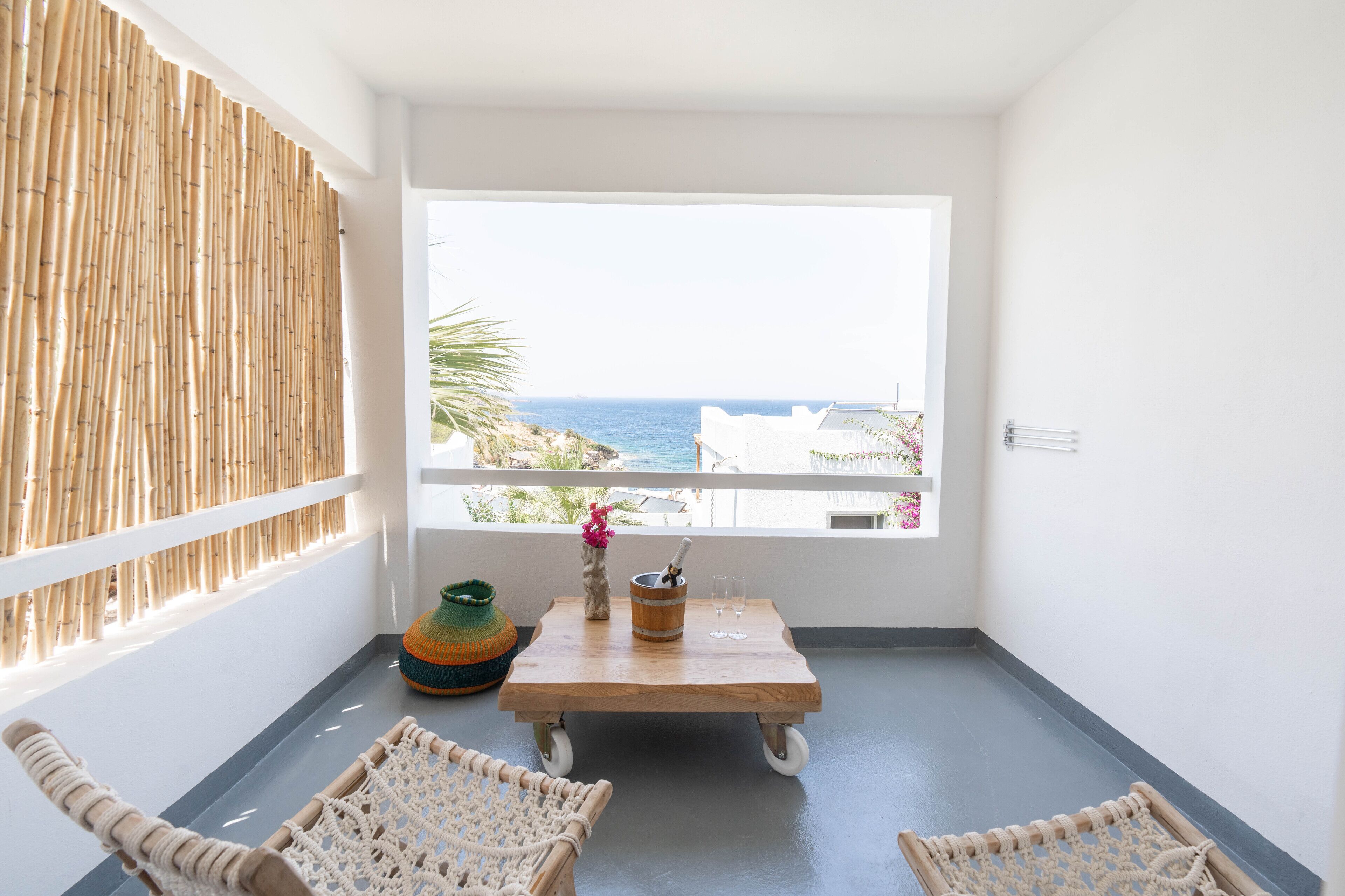 junior studio suite, 1 king bed, balcony, sea view | beach/ocean view