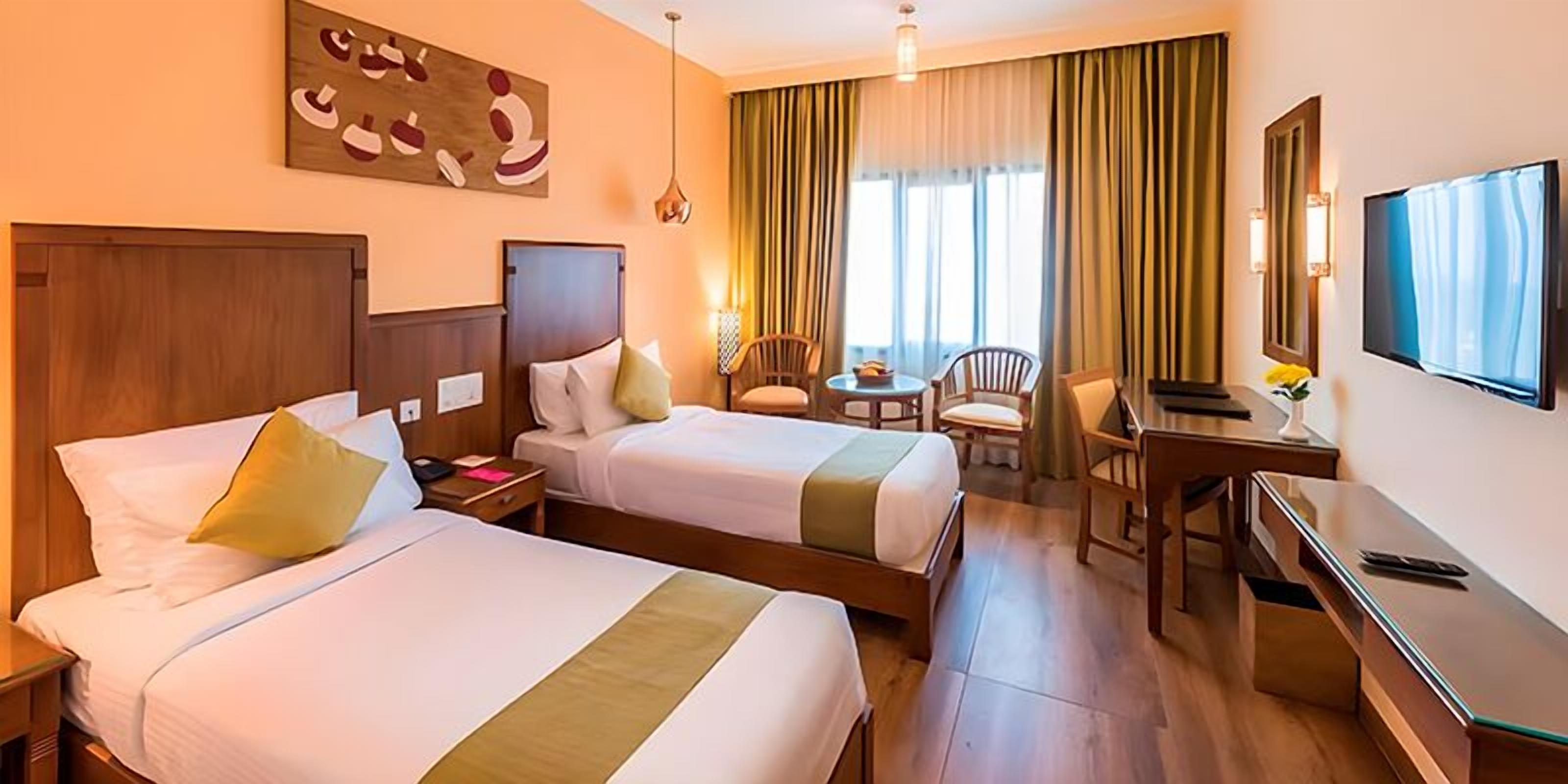 Deluxe Twin Room | 1 bedroom, minibar, in-room safe, desk