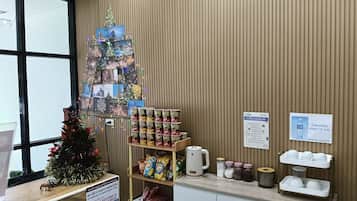 Standard Double Room | Living area | 32-inch flat-screen TV with cable channels, TV