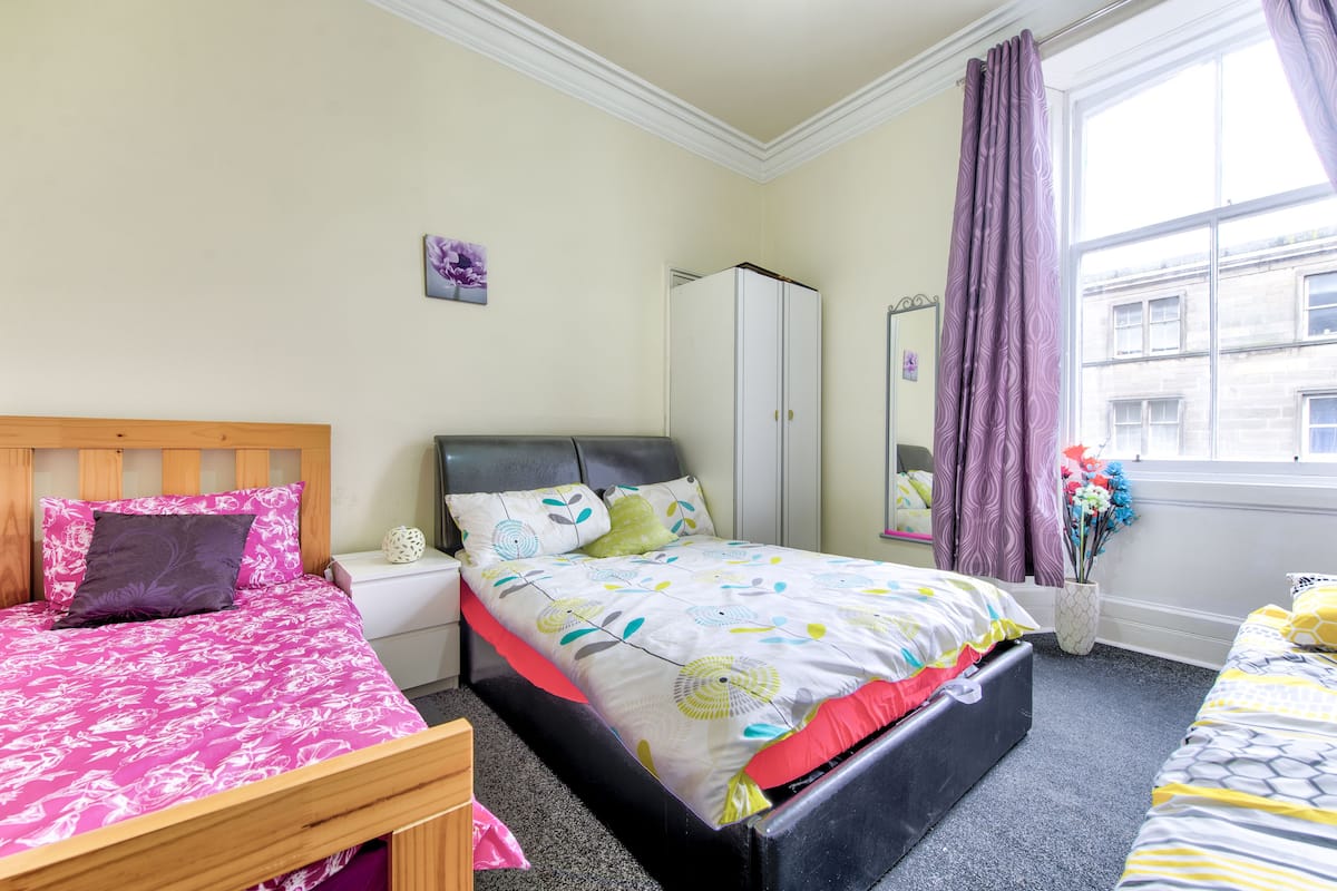 Standard Quadruple Room, Shared Bathroom | WiFi (free), bed sheets