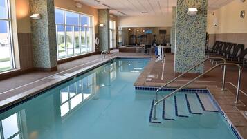 Indoor pool, open 6:00 AM to midnight, pool loungers