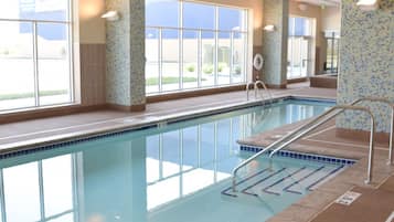 Indoor pool, open 6:00 AM to midnight, pool loungers