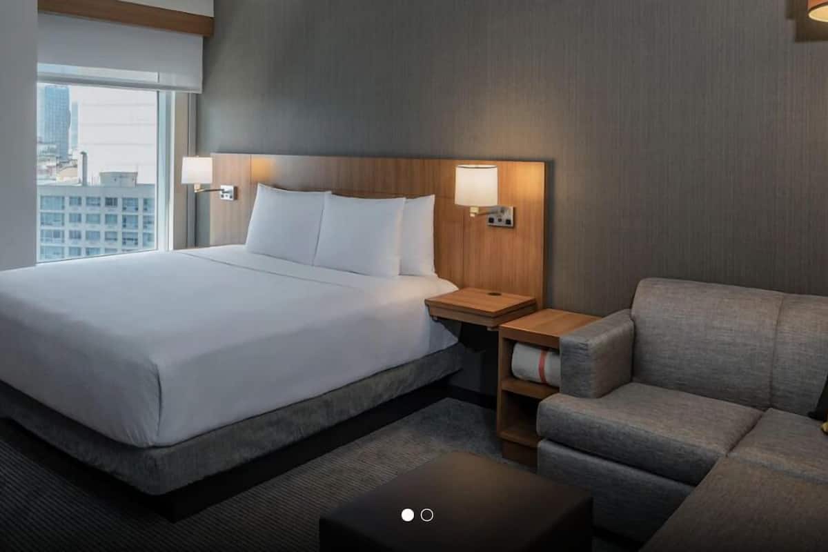 hypo-allergenic bedding, in-room safe, desk, blackout curtains