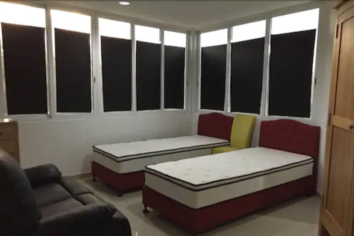 Minibar, desk, bed sheets