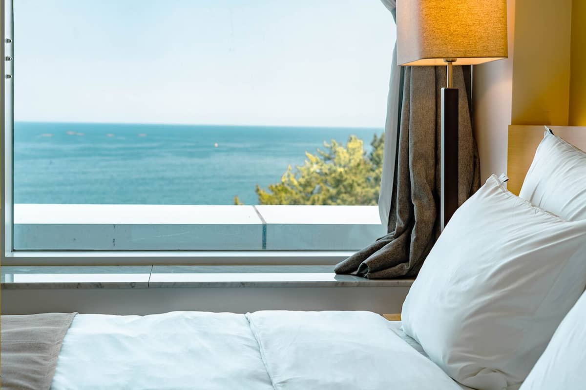 Ocean View Wellness Suite | Premium bedding, down comforters, iron/ironing board (on request)