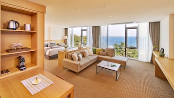 Junior Suite, Ocean View | Living area | Flat-screen TV