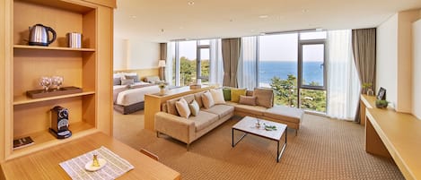 Junior Suite, Ocean View | Living area | Flat-screen TV