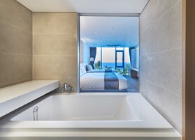 Deluxe Twin Ocean View | Bathroom | Eco-friendly toiletries, hair dryer, slippers, towels