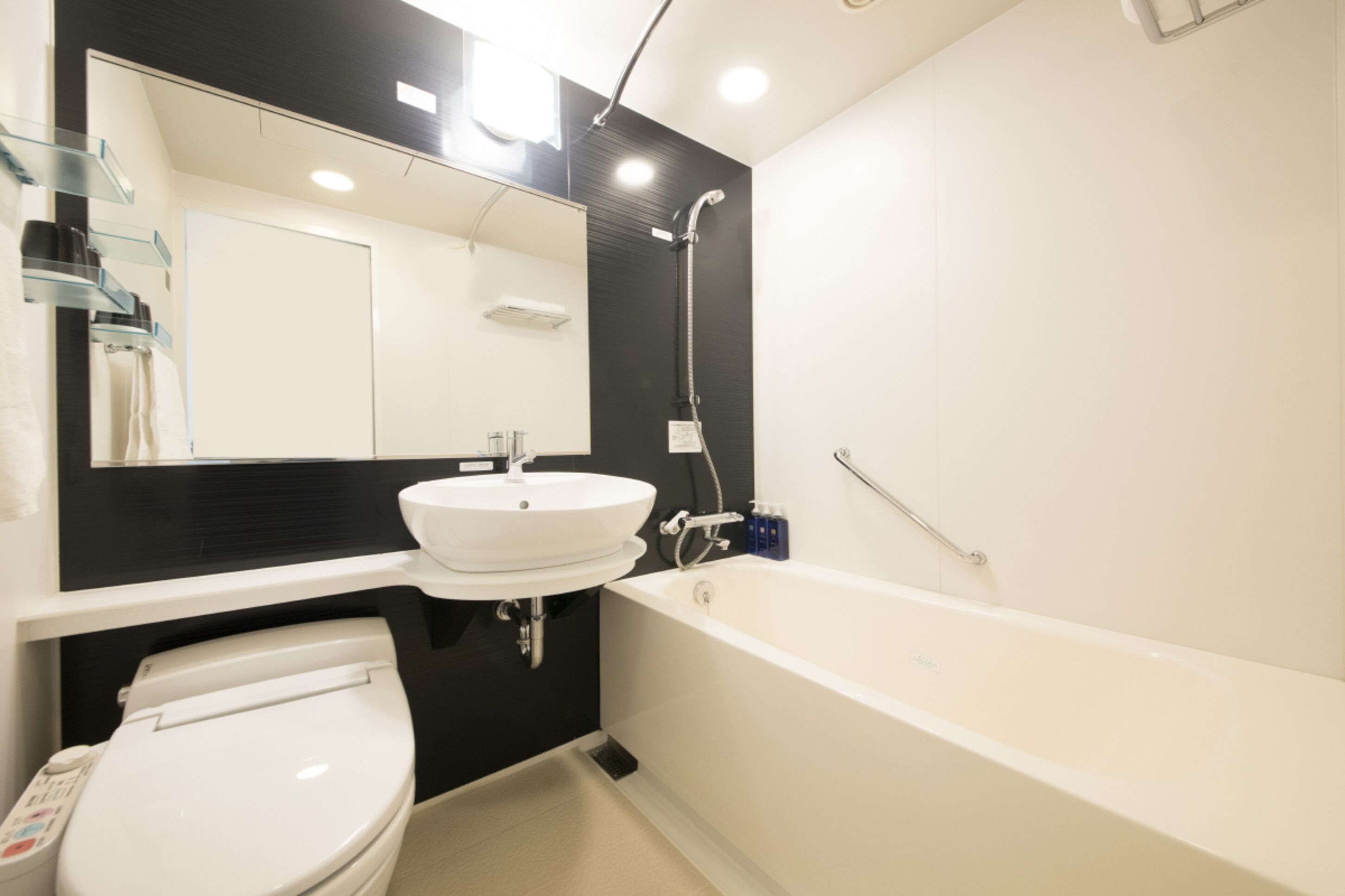 shower, hair dryer, slippers, bidet