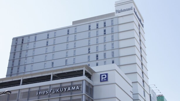 A multi-story building with a sign reading "Richmond" at the top. - Richmond Hotel Fukuyama Ekimae (Fukuyama)