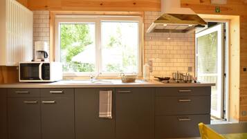 Fridge, microwave, stovetop, coffee/tea maker