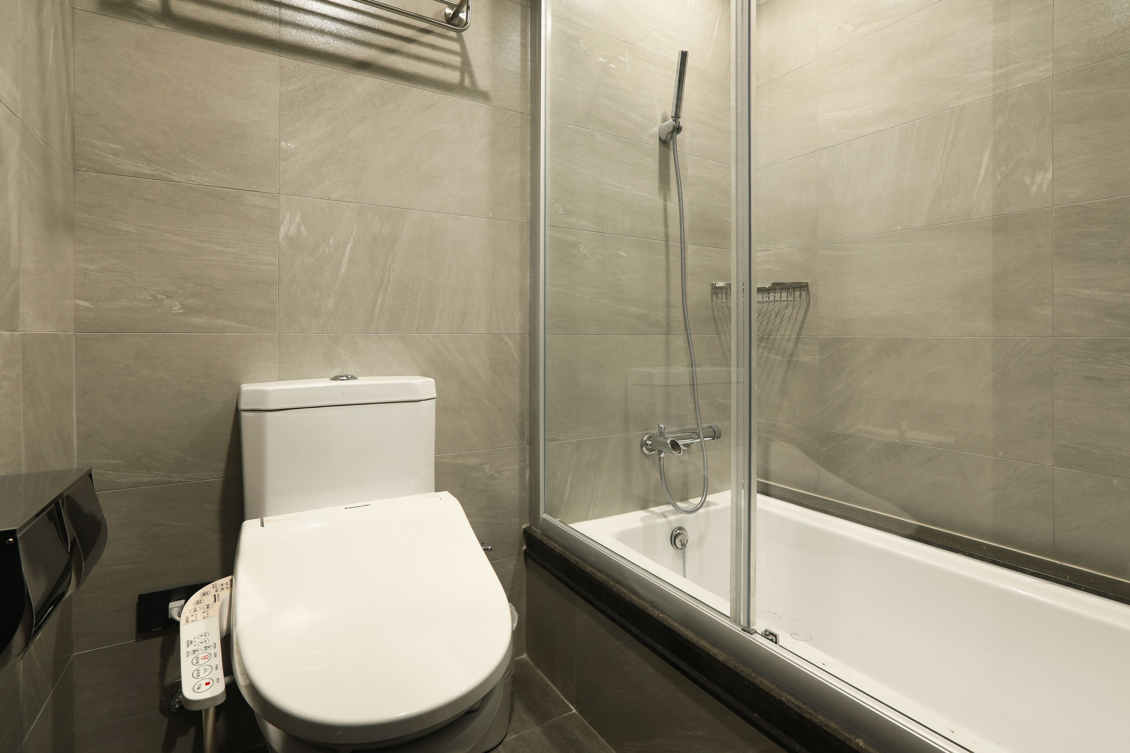 superior twin room | bathroom | shower, hair dryer, bidet, towels