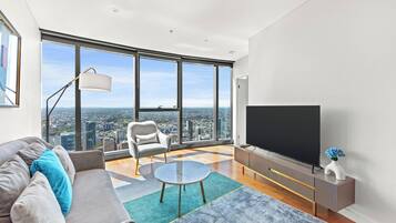 Two Bedroom Two Bathroom Apartment with City Views (Levels 17 - 38) | Living area | 55-inch flat-screen TV with digital channels, TV