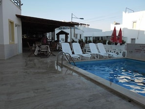 Outdoor pool, pool umbrellas, pool loungers