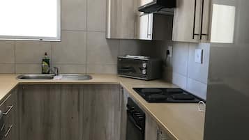 Apartemen, 2 kamar tidur, pemandangan laut | Dapur pribadi | Lemari es besar, microwave, oven, dan kompor
