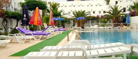 Outdoor pool, pool umbrellas, pool loungers