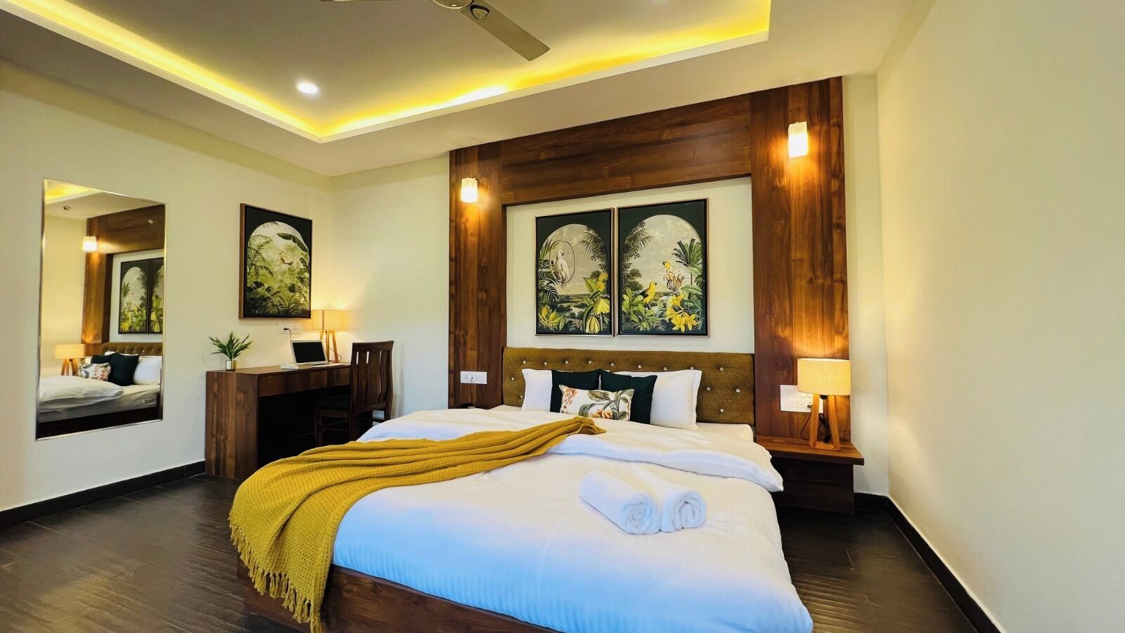 Family Room | Minibar, in-room safe, individually furnished, desk