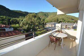 Apartamento família, 1 quarto | Sacada