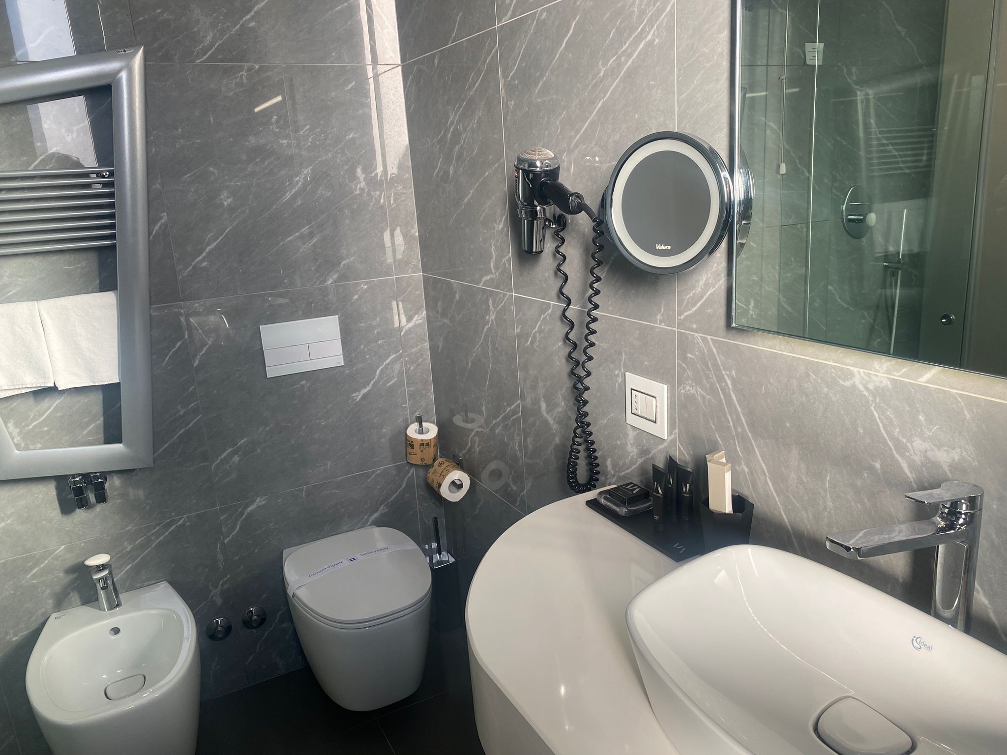 free toiletries, hair dryer, bidet, towels