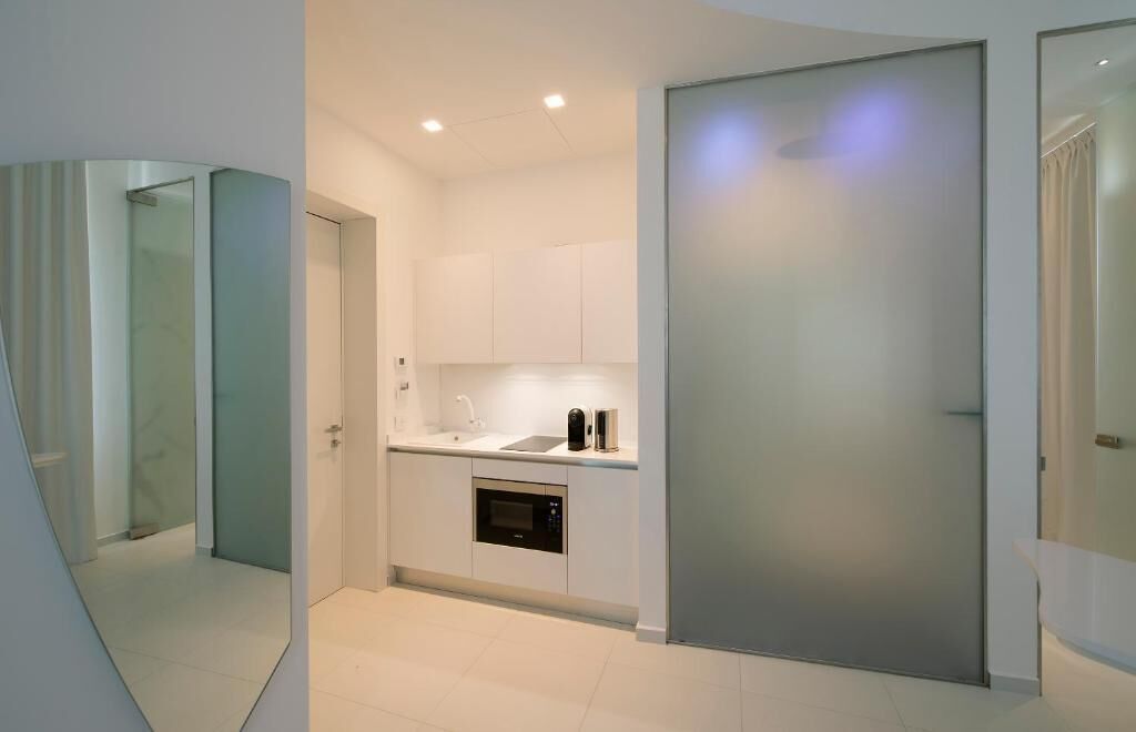 luxury studio, jetted tub | private kitchen | microwave, stovetop, coffee/tea maker, electric kettle