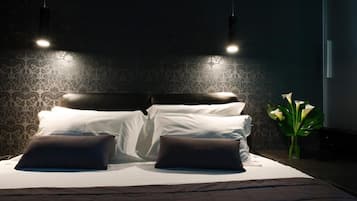 Frette Italian sheets, premium bedding, down comforters, in-room safe