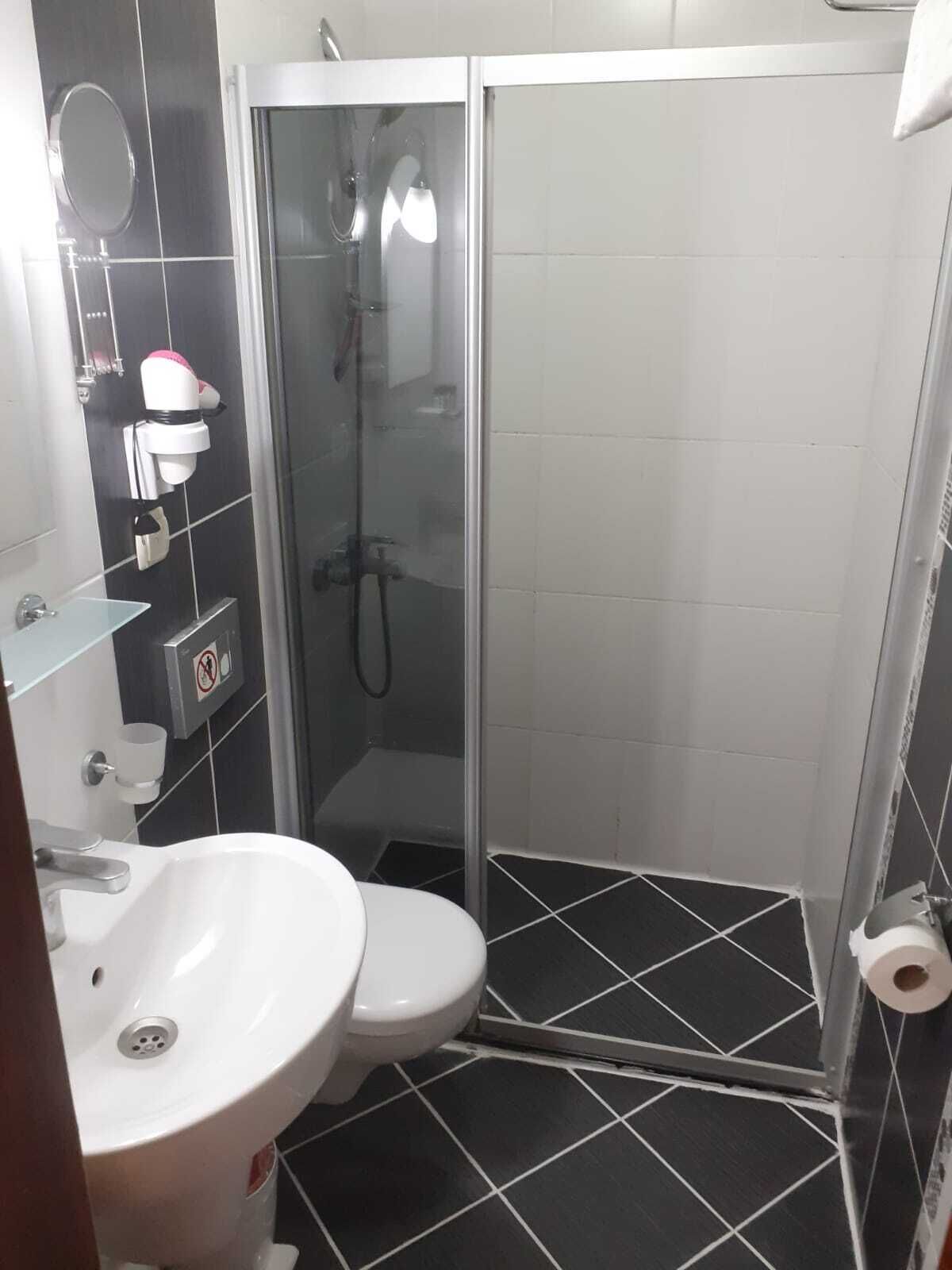 standard double room | bathroom | shower, free toiletries, hair dryer, slippers