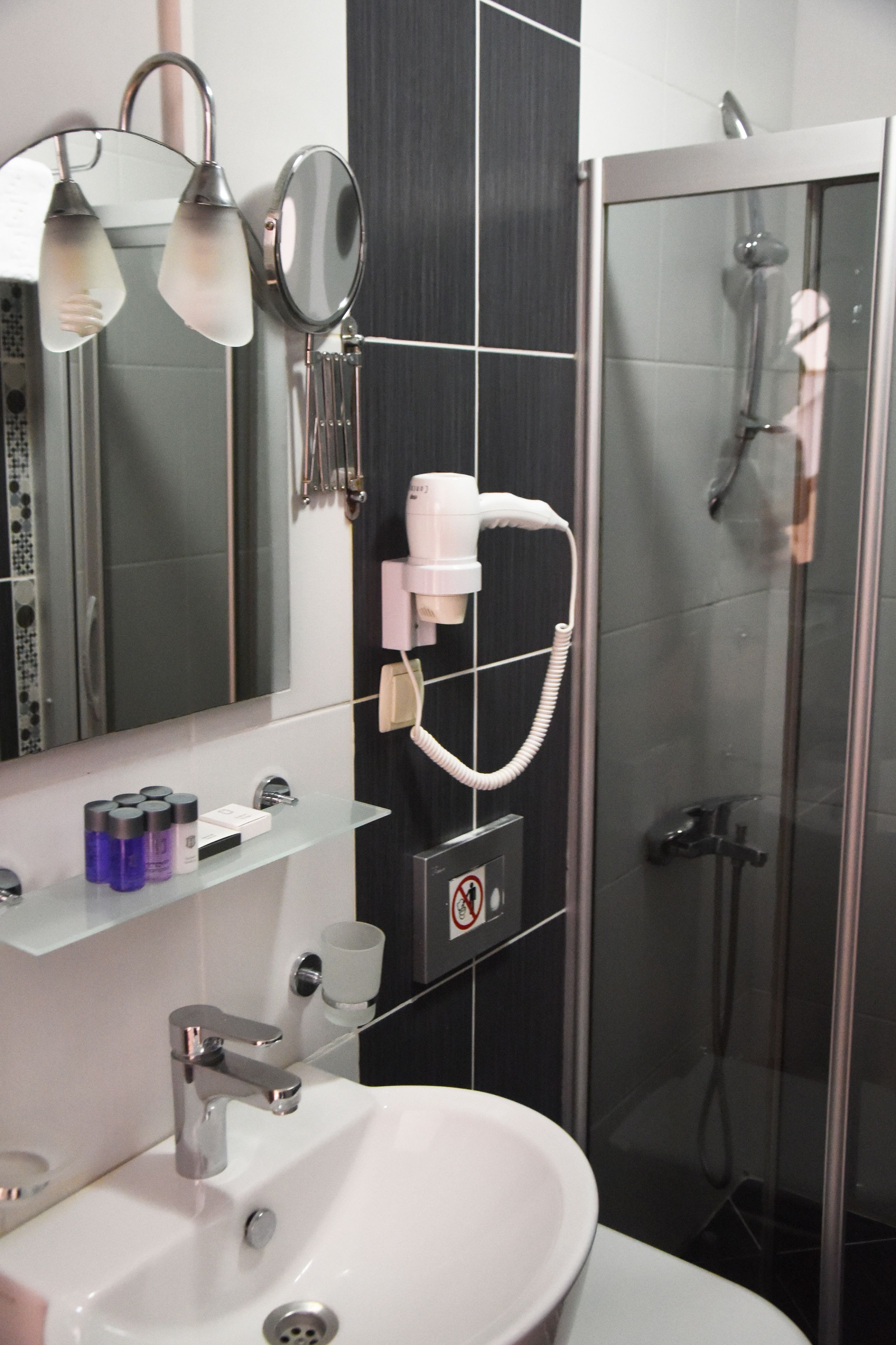 shower, free toiletries, hair dryer, slippers