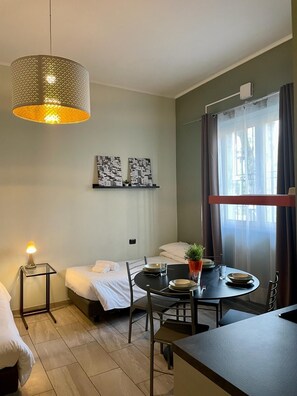 Family Apartment, Non Smoking | Living area | 32-inch flat-screen TV with digital channels, TV, Netflix - Residence La Red (Rho)